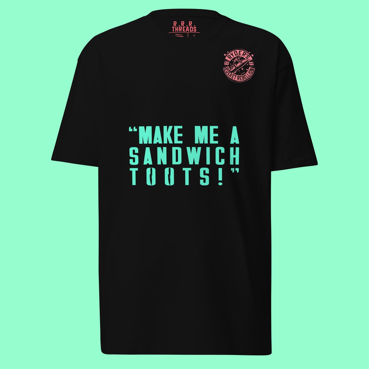 Black t-shirt with green text on a light blue background