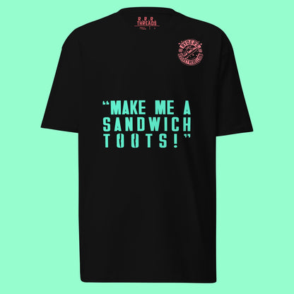 Black t-shirt with green text on a light blue background